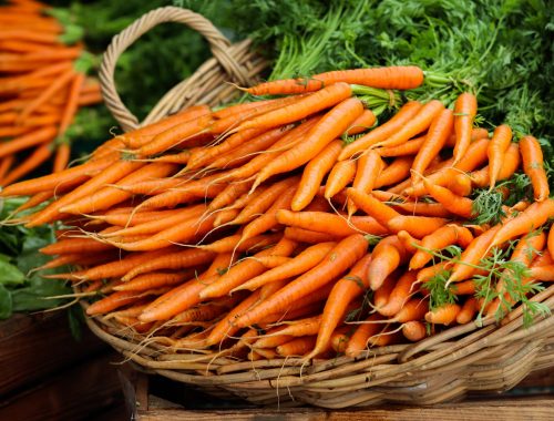 orange carrots on brown woven basket